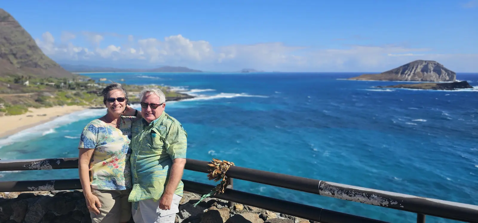 Couple enjoying a panoramic Southeast Oʻahu ocean lookout