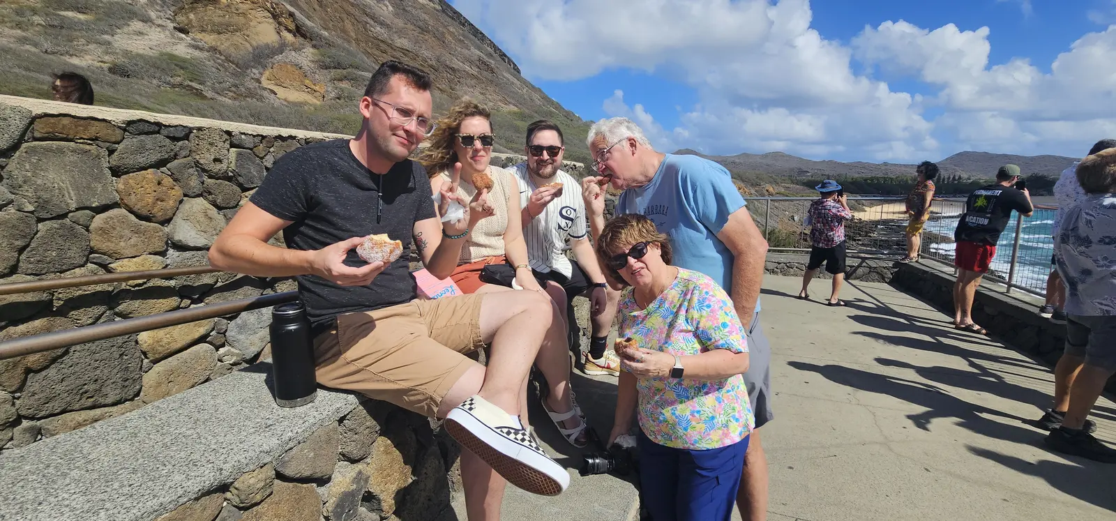 Guests enjoying a relaxed local snack and photo stop